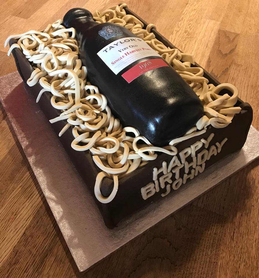 rectangle cake shaped into a wine box with a bottle of port on top made out of cake by Creative Cakes by Kaz