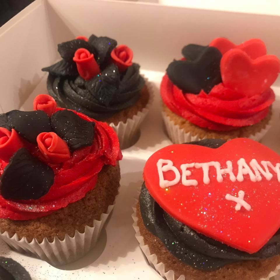 cupcakes with red and black fondant flowers and hearts 