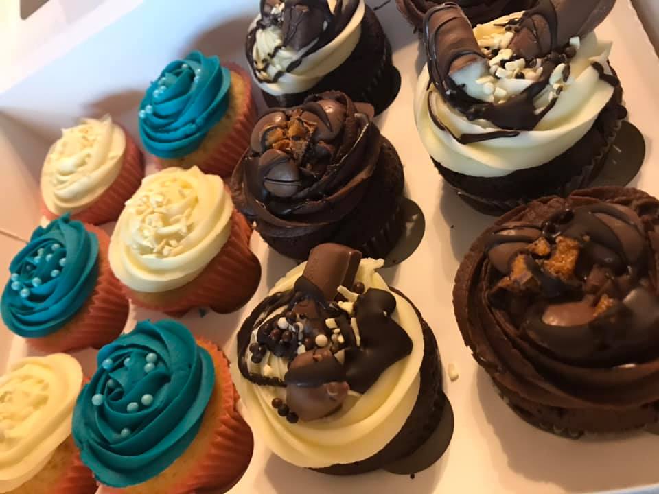 Cupcakes with chocolates on top 