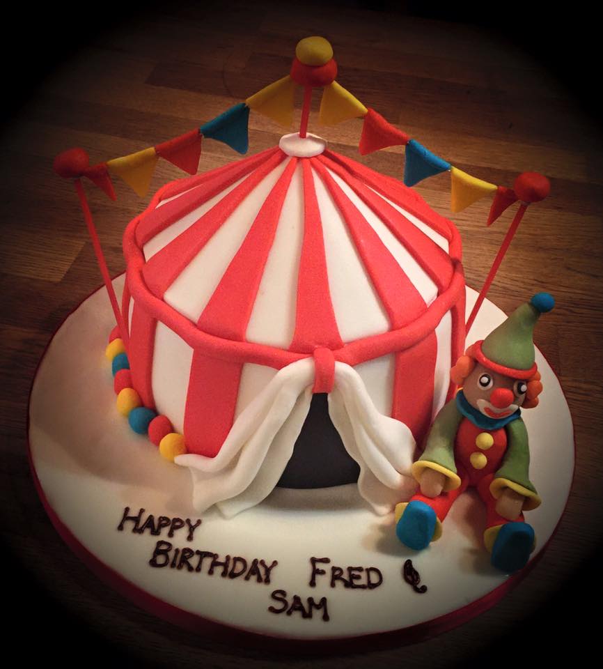 A cake with a Circus theme with a fondant clown Birthday & Novelty Cakes